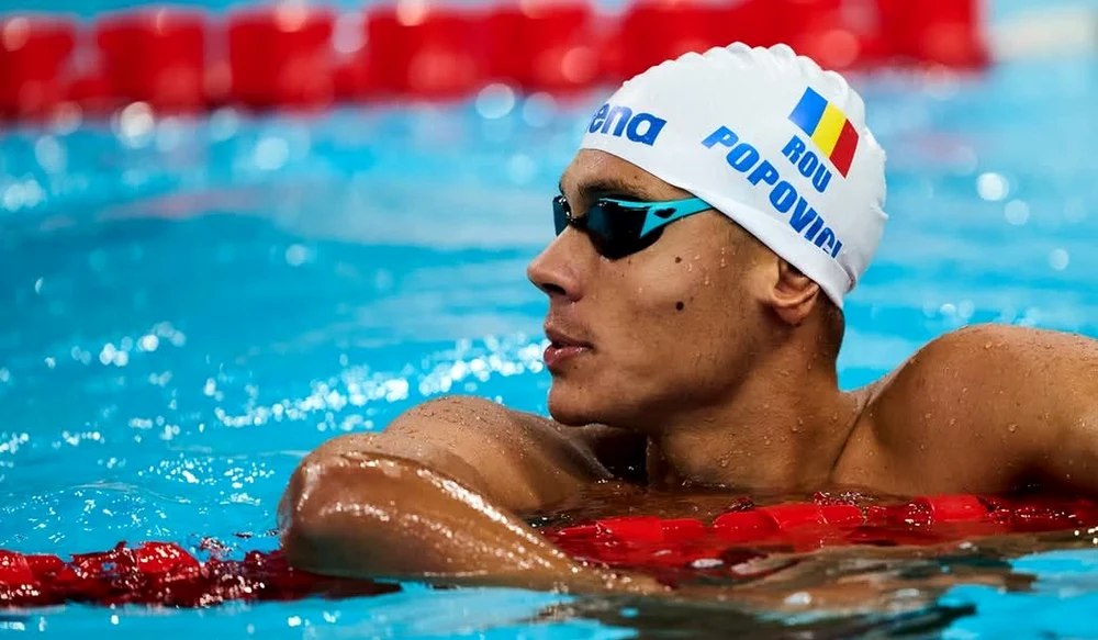 Medalie de aur şi record european pentru David Popovici la 100 m liber. A obținut al doilea timp din istorie